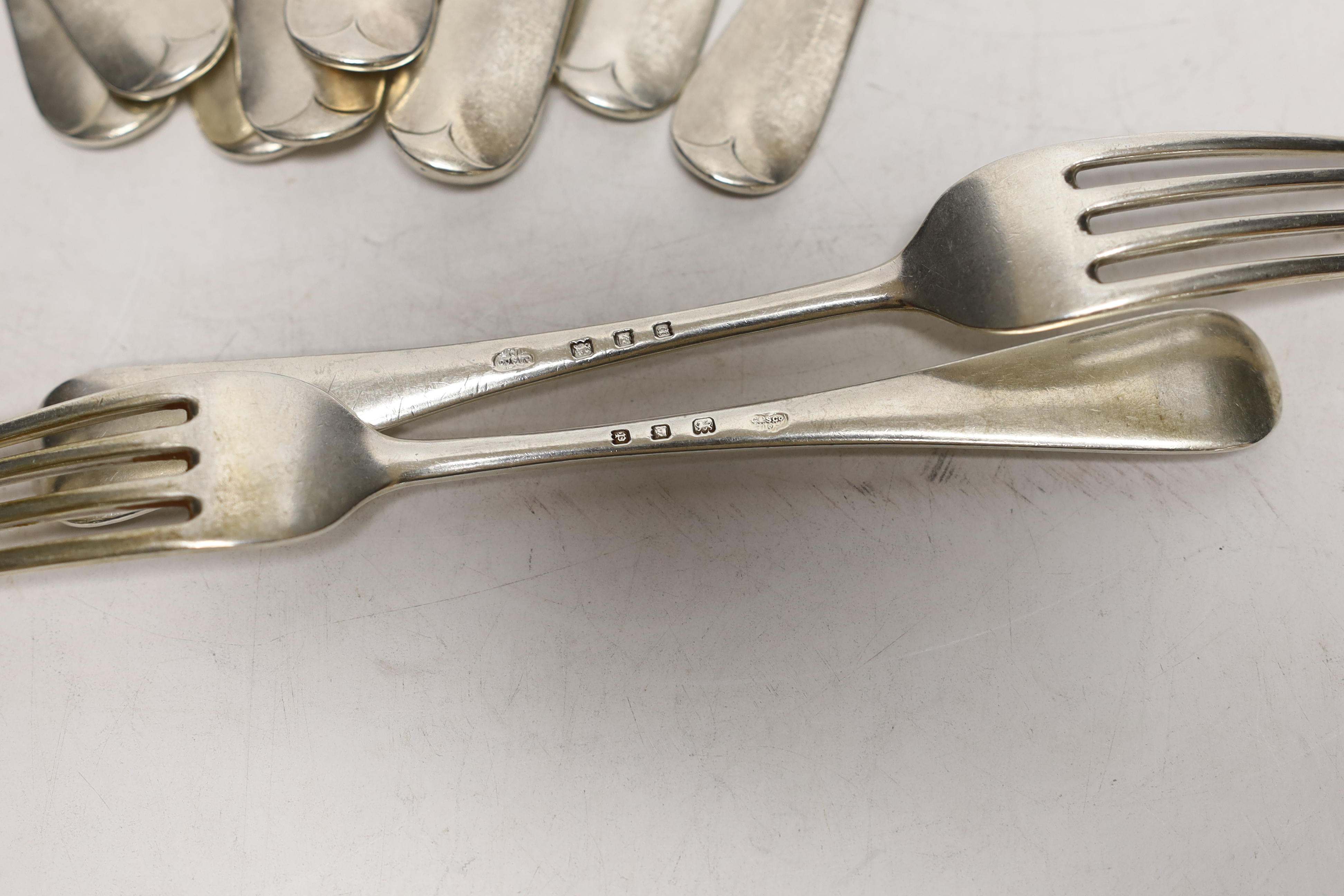 A set of twelve George V silver Old English pattern dessert forks, Goldsmiths & Silversmiths Co Ltd, London, 1930, 20oz.